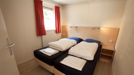 Schlafzimmer - RCN Vakantiepark het Grote Bos