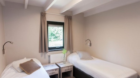 Schlafzimmer - RCN Vakantiepark de Flaasbloem