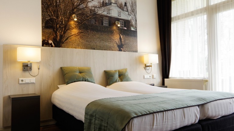 Superior tweepersoonskamer met balkon - Hotel en Restaurant van Saaze