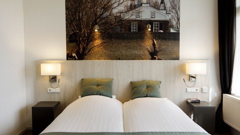 Superior tweepersoonskamer met balkon - Hotel en Restaurant van Saaze