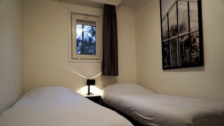 Slaapkamer - EuroParcs Beekbergen Slaapkamer - EuroParcs Beekbergen