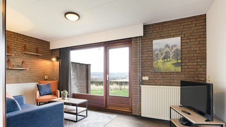 Wohnzimmer - Summio Vakantiepark Reevallis