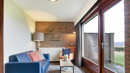 Wohnzimmer - Summio Vakantiepark Reevallis