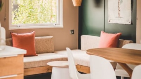 Woonkamer - RCN Camping La Ferme du LatoisSlaapplaats - RCN Camping La Ferme du Latois