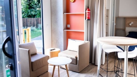 Woonkamer - RCN Camping Belledonne Woonkamer - RCN Camping Belledonne