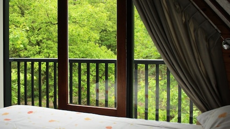 Schlafzimmer - Summio Bungalowpark Herperduin