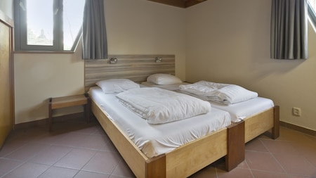 Schlafzimmer - Summio Bungalowpark Herperduin