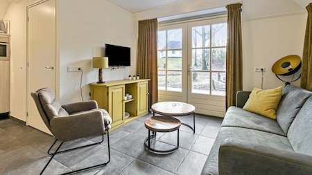 Wohnzimmer - Summio Bungalowpark Herperduin