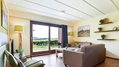Wohnzimmer - Summio Vakantiepark Reevallis