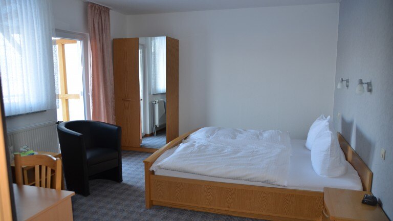 Dreibettzimmer mit Balkon