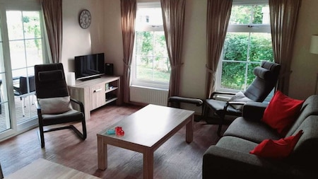 Woonkamer - Vakantiepark de Luttenberg Woonkamer - Vakantiepark de Luttenberg