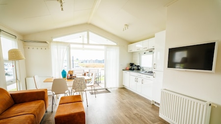 Woonkamer - Vakantiepark Eiland van Maurik Woonkamer - Vakantiepark Eiland van Maurik