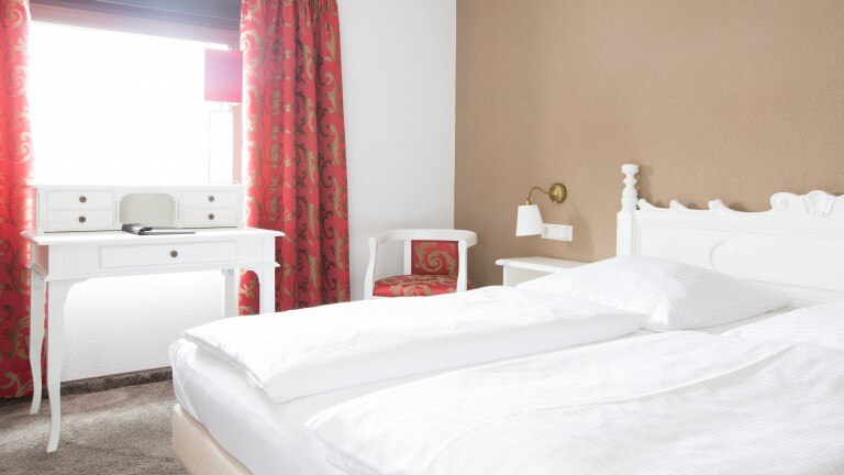 Standardzimmer – Boutique Hotel Goldhahn