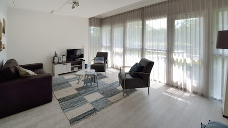 Wohnzimmer - Summio Villapark Schildmeer