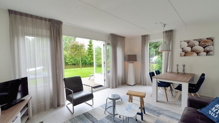 Wohnzimmer - Summio Villapark Schildmeer
