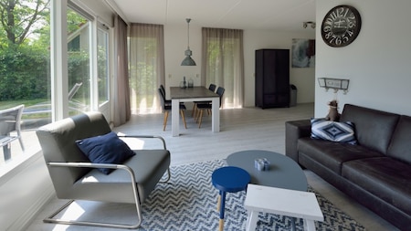 Wohnzimmer - Summio Villapark Schildmeer