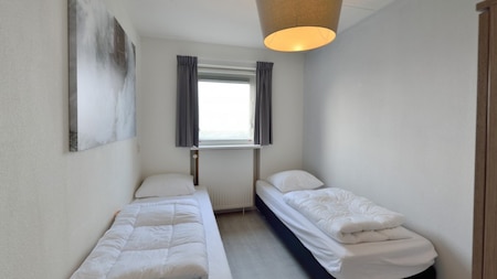 Schlafzimmer - Summio Villapark Schildmeer