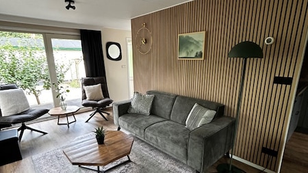 Woonkamer - Vakantiepark de Ossenberg Woonkamer - Vakantiepark de Ossenberg