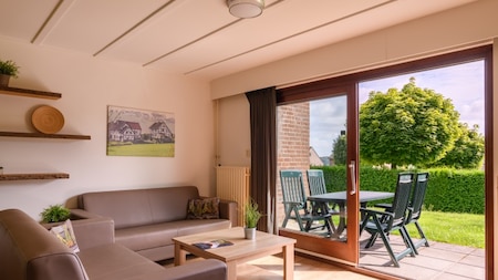 Wohnzimmer - Summio Vakantiepark Reevallis