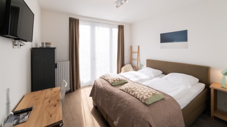 Zimmer mit Meerblick und Balkon