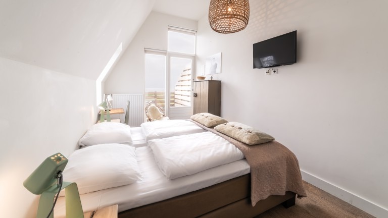 Zimmer mit Meerblick und Balkon