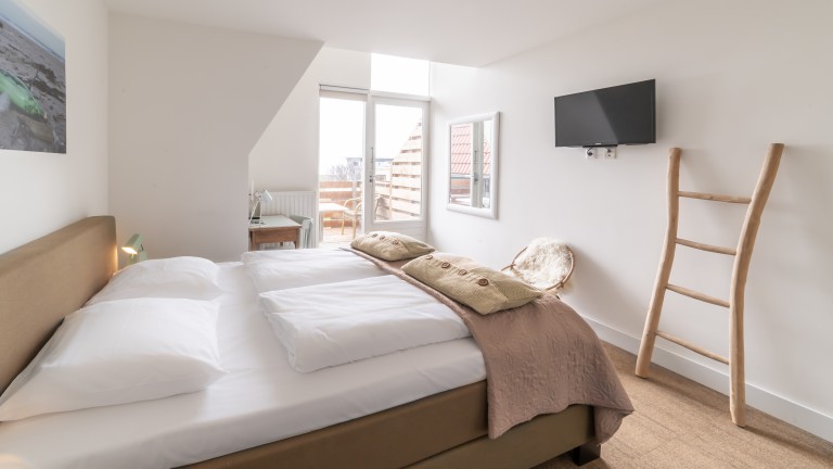 Zimmer mit Meerblick und Balkon