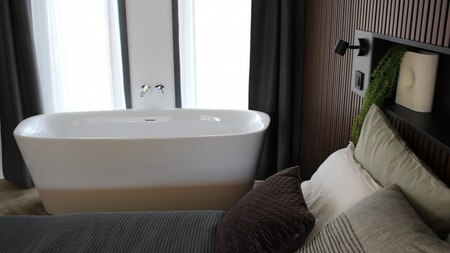 Slaap en badkamer - EuroParcs Ossiacher See Slaap en badkamer - EuroParcs Ossiacher See