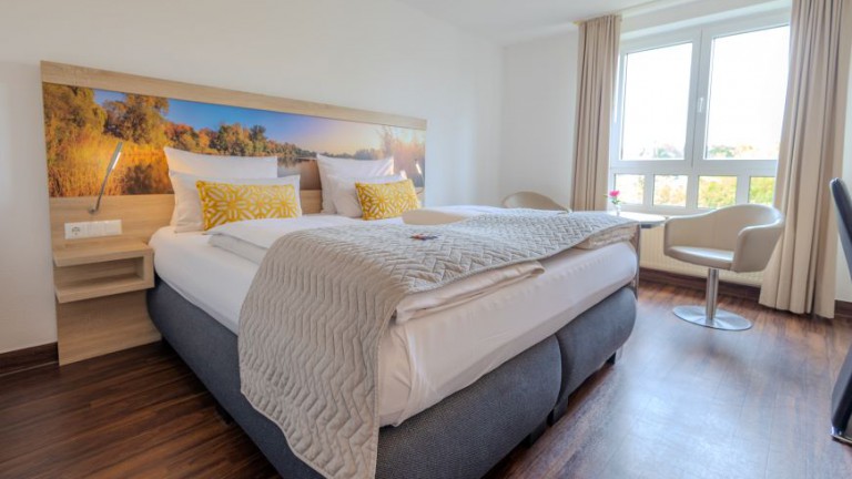 Standaardkamer Flussseite - CASCADA Rheine by Hackmann