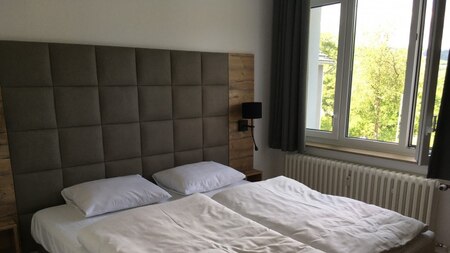 Schlafzimmer - Apartments Alte Schule Züschen