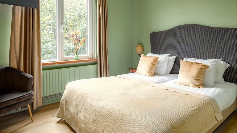 Comfort kamer met tweepersoonsbed en zitje