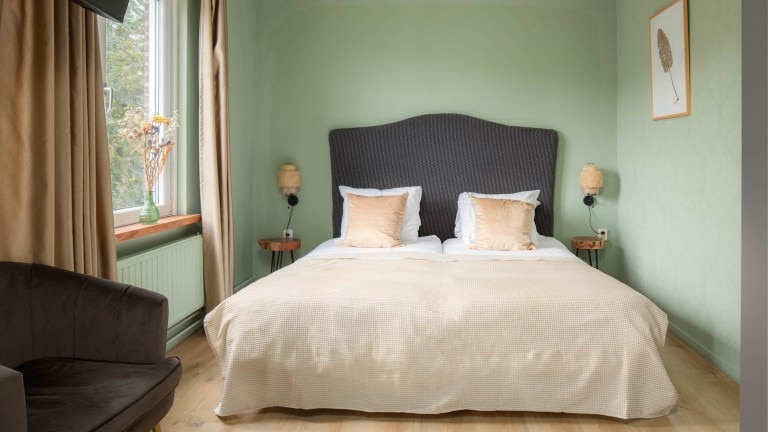 Comfort kamer met tweepersoonsbed en zitje