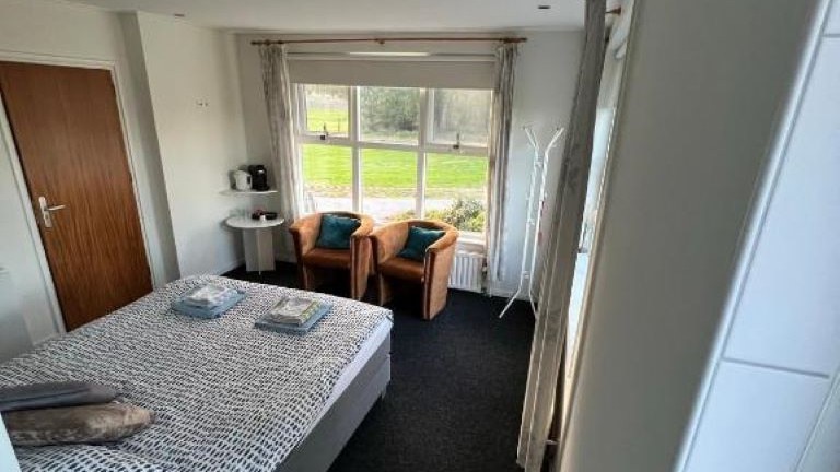 Deluxe tweepersoonskamer - Bed and breakfast Zwiep