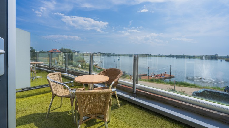 Rivierzicht kamer met balkon - Hotel Hoogeerd