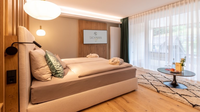 Deluxe design juniorsuite met balkon - Sackmann Genusshotel