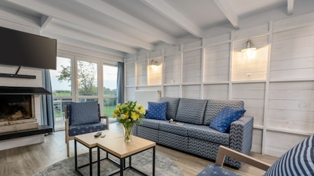 Woonkamer - Center Parcs Park de Haan Woonkamer - Center Parcs Park de Haan