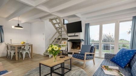 Woonkamer - Center Parcs Park de Haan Woonkamer - Center Parcs Park de Haan