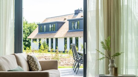 Woonkamer - Villapark de Koog