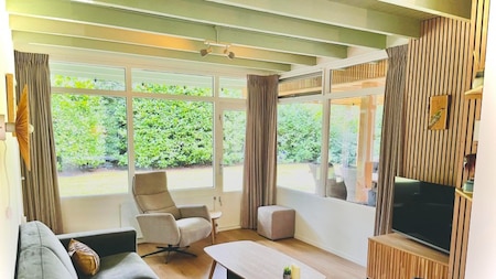 Woonkamer - Vakantiepark De Kremmer Woonkamer - Vakantiepark De Kremmer