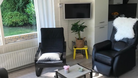 Woonkamer - Vakantiepark de Kremmer Woonkamer - Vakantiepark de Kremmer