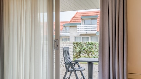 Terras - Roompot Appartementencomplex Bosch en Zee