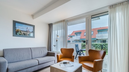 Woonkamer - Roompot Appartementencomplex Bosch en Zee