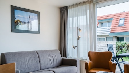 Woonkamer - Roompot Appartementencomplex Bosch en Zee