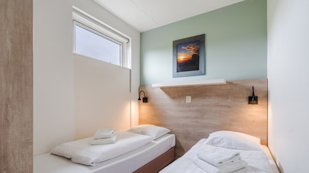 Slaapkamer - Roompot Appartementencomplex Bosch en Zee