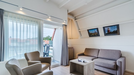 Woonkamer - Roompot Appartementencomplex Bosch en Zee