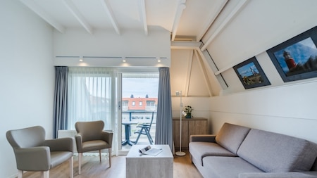 Woonkamer - Roompot Appartementencomplex Bosch en Zee