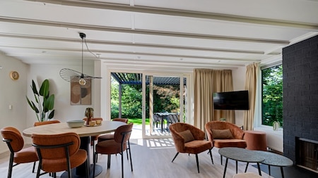 Woonkamer - RCN Vakantiepark De Roggeberg Woonkamer - RCN Vakantiepark De Roggeberg