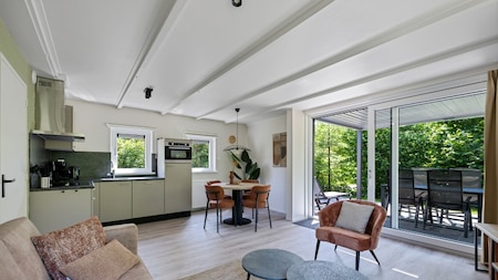 Woonkamer - RCN Vakantiepark De Roggeberg Woonkamer - RCN Vakantiepark De Roggeberg