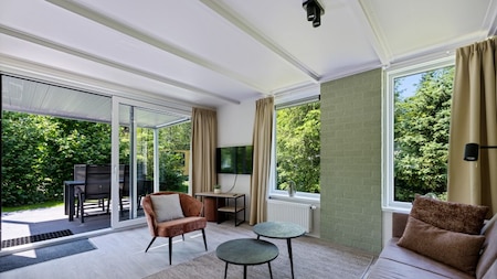 Woonkamer - RCN Vakantiepark De Roggeberg Woonkamer - RCN Vakantiepark De Roggeberg