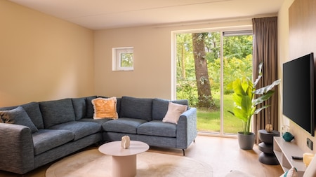 Woonkamer - Dormio Resort De Hondsrug