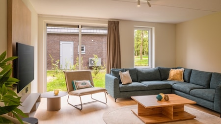 Woonkamer  - Dormio Resort De Hondsrug